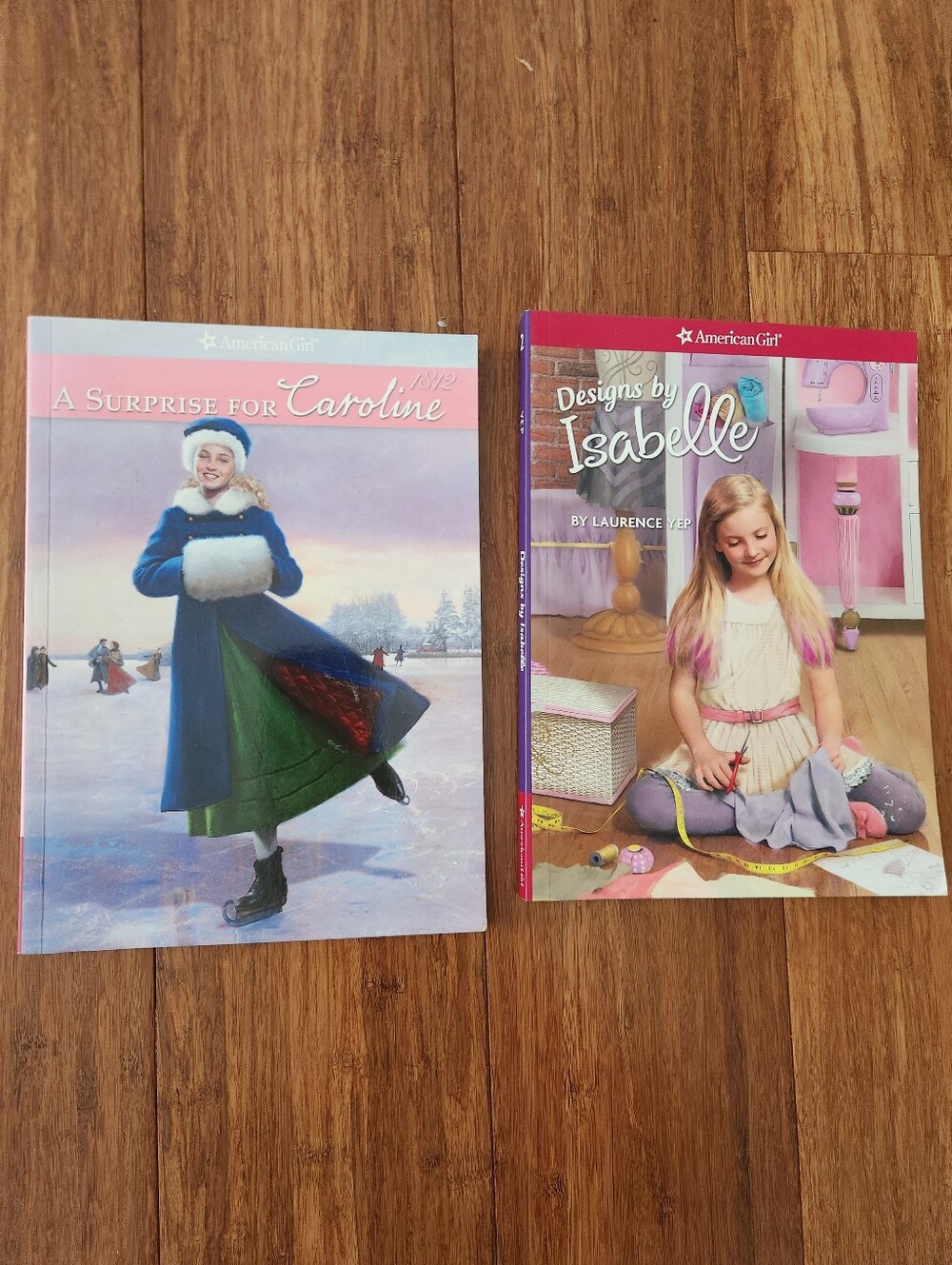 American Girl "A Surprise For Caroline" And "Designs By Isabelle" Books